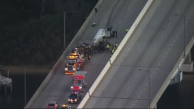 Tanker truck carrying propane overturns on Severn River Bridge