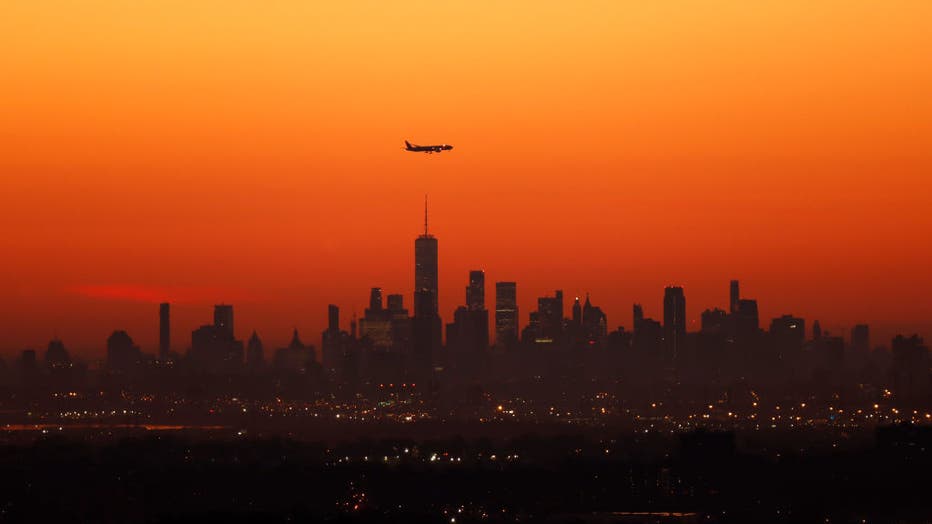 8839ab32-Sunrise Behind Lower Manhattan in New York City