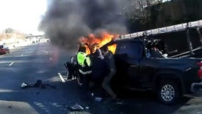Rescue caught on video when ambulance crew, police officer come across fiery crash in Annapolis