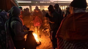 Migrants near US-Mexico border wait in the cold for key asylum ruling