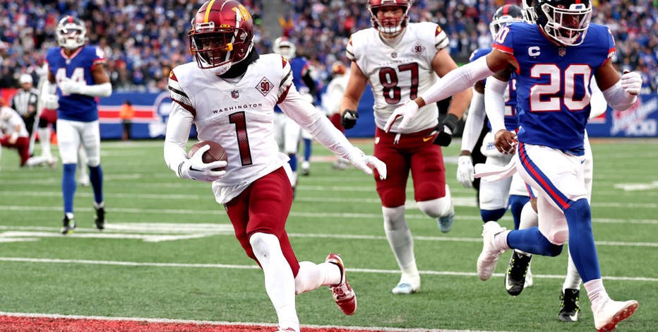 New York Giants middle linebacker Uani' Unga (47) makes a interception in  the third quarter against the Washington Redskins in week 3 of the NFL  season at MetLife Stadium in East Rutherford