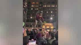 Super Bowl LVII: Philadelphia Eagles fan crowd surfs through Philly streets after NFC Championship win
