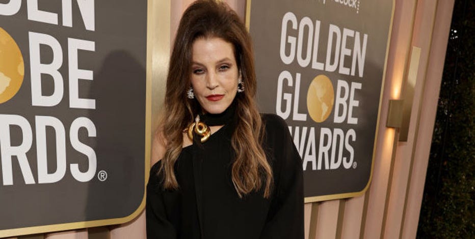 lisa marie presley golden globes dress made final public outing at Globes, applauding Austin Butler for 'Elvis' award Collection: MODEST
