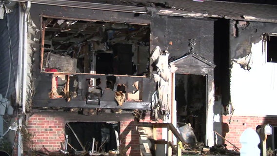 Woman pulled from burning home in Rockville dies from injuries