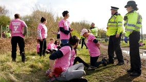 More than 100 arrested as animal activists protest Grand National horse race