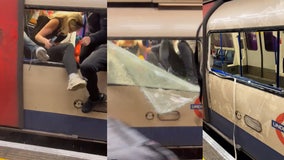 Watch: Terrified commuters smash windows to escape smoke-filled London train