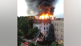 Firefighters battle massive fire on roof of Adams Morgan condo