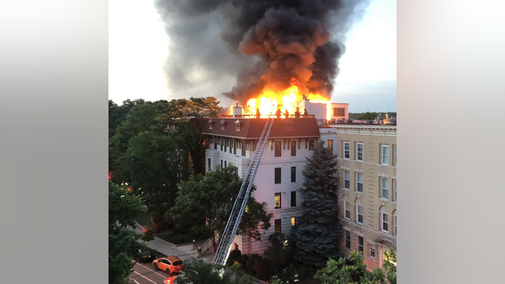 Firefighters battle massive fire on roof of Adams Morgan condo