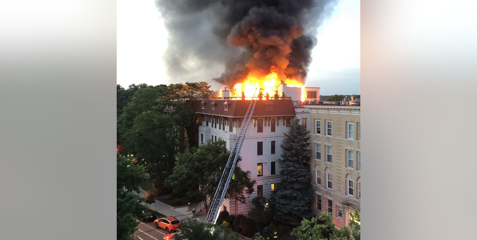 Firefighters battle massive fire on roof of Adams Morgan condo
