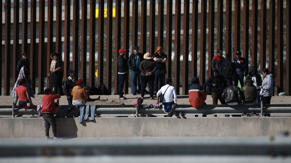 FILE - Migrants wait at the U.S.-Mexico border on Jan. 8, 2023 in Ciudad Juarez, Mexico. (Photo by Christian Torres/Anadolu Agency via Getty Images)