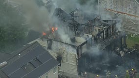 Firefighters battle 2-alarm fire in Laurel