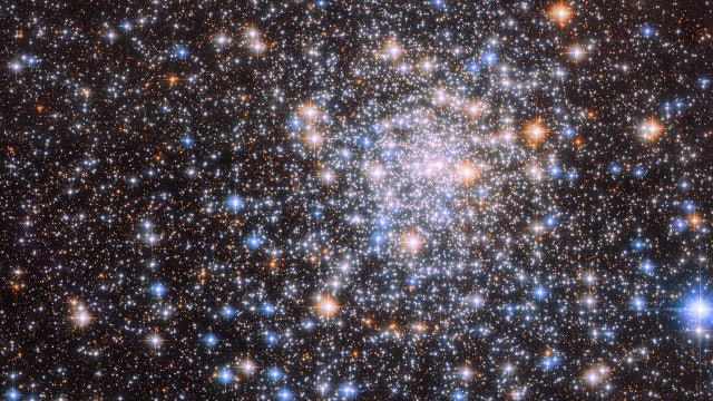 ‘Glistening’ cluster teeming with stars captured by Hubble telescope