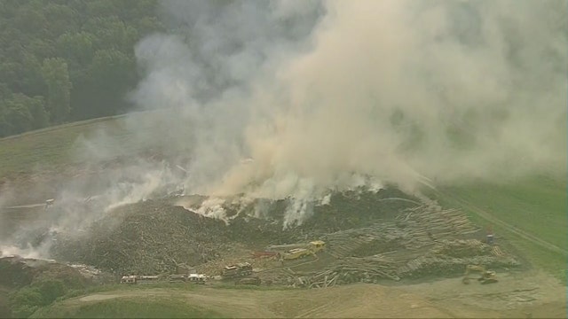 Virginia landfill fire sends flames, smoke into sky