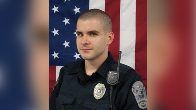 Virginia officer shot, killed during struggle with assault suspect in woods