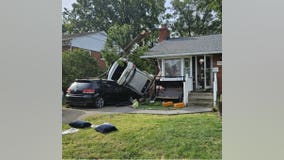 Car crashes into home, leaves 2 injured in College Park