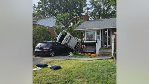 Car crashes into home, leaves 2 injured in College Park