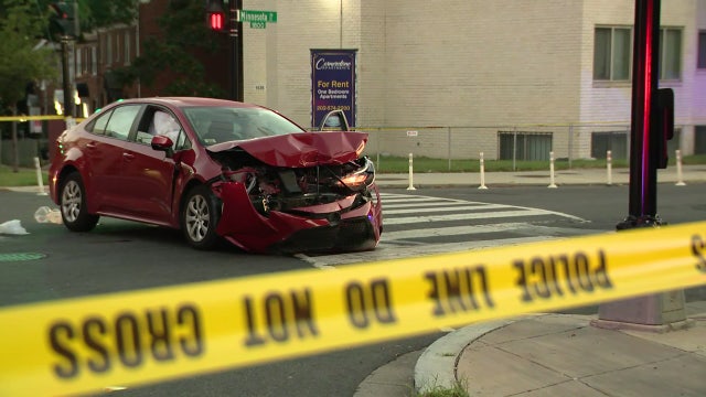 Driver crashes car after being shot at DC intersection