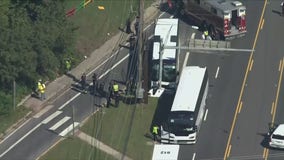 27 transported after bus crashes into pole in College Park