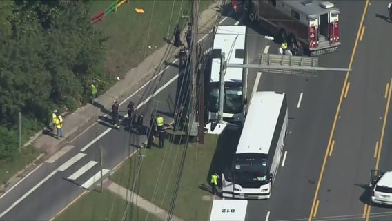 27 transported after bus crashes into pole in College Park