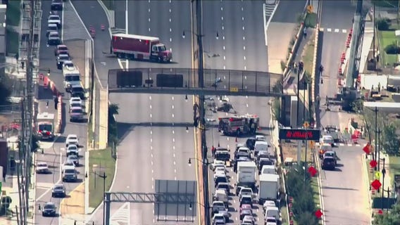 DC pedestrian bridge over I-295 struck by load on passing vehicle; structure being evaluated