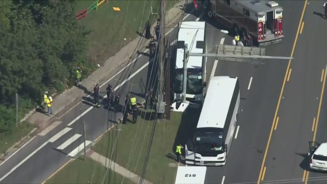 27 transported after bus crashes into pole in College Park