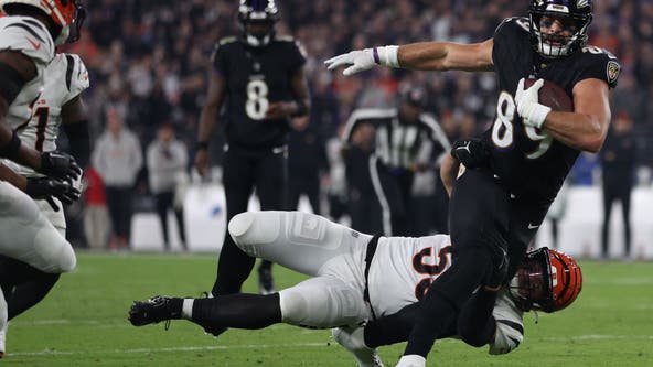 Ravens handle Bengals 34-20 after Joe Burrow exits in the 2nd quarter with a wrist injury