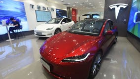 Federal EV tax credit slashed in half for some Tesla Model 3s in 2024