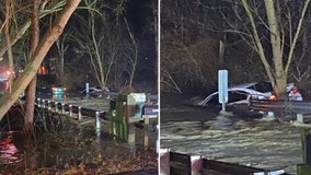 Rescuers find driver clinging to tree after being swept away by floodwaters in Montgomery County