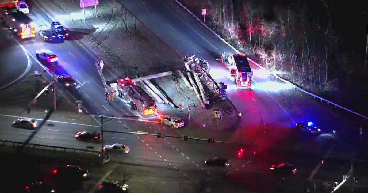 Overturned tractor-trailer spills logs onto roadway in Crofton | FOX 5 DC
