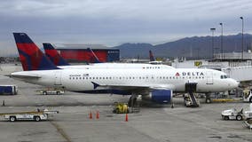 FBI: Delta passenger restrained midflight for spitting, harassing travelers and crew