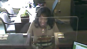 Surveillance photo shows woman cashing a fraudulent check at Bethesda bank