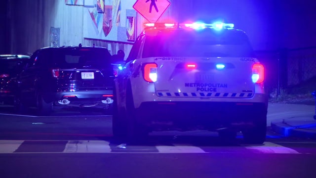 Man dead, woman wounded in shooting at DC apartment building