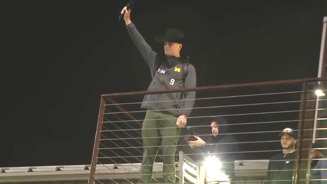 Watch: National champion Michigan football team returns home from Houston