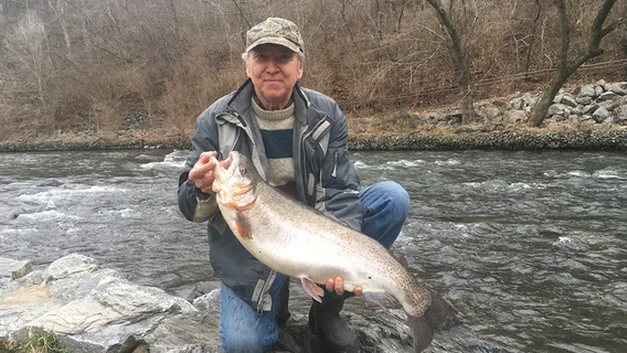 Maryland fisherman shatters state record after reeling in massive rainbow trout: 'Feels good'