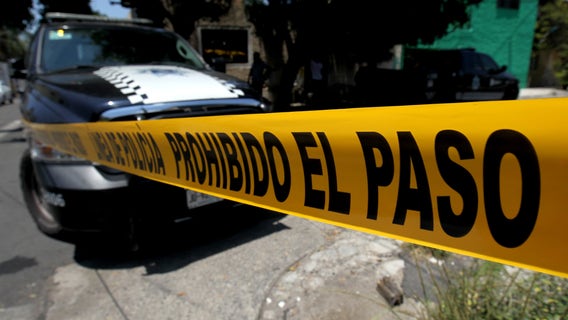 A dozen bodies found in Mexico, 5 piled in an SUV and 7 others near the US border with Arizona