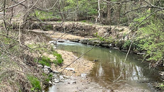 2 ATMs discovered in DC creek, retrieved by crane