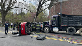 Vehicle flips in multi-vehicle collision involving dump truck in DC