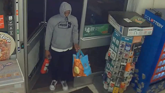 VIDEO: Suspect sprays fire extinguisher at employees during 2 robberies in DC