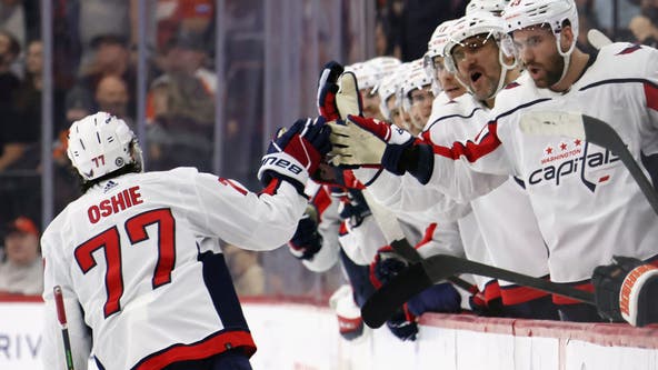 Oshie's empty netter seals Capitals playoff berth in dramatic win over Flyers
