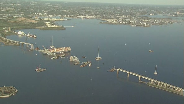 Baltimore Key Bridge Collapse: First cargo ship passes through newly opened deep-water channel