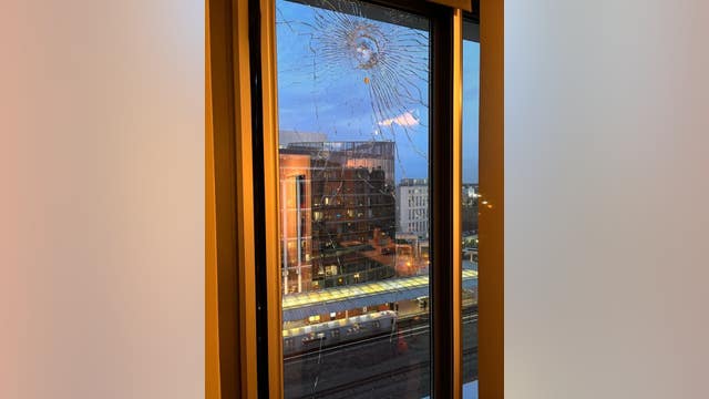 DC fight leaves 2 on Metro tracks, bullet strikes apartment window nearby