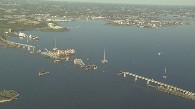 Baltimore Key Bridge Collapse: First cargo ship passes through newly opened deep-water channel