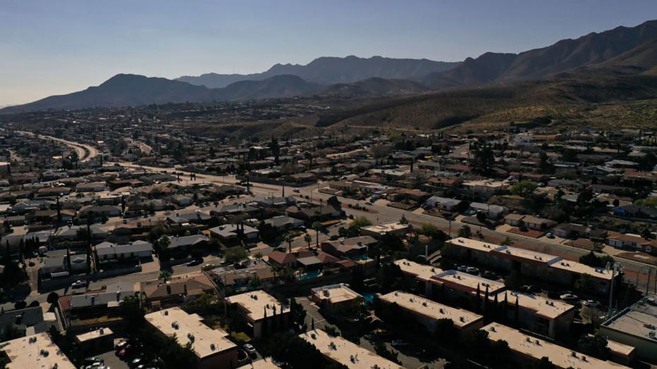 FILE - An aerial view shows homes and apartments in a neighborhood in El Paso, Texas, on December 19, 2022. (Photo by PATRICK T. FALLON/AFP via Getty Images)