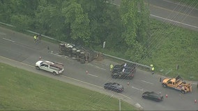 Dump truck flips on side, loses load in Upper Marlboro