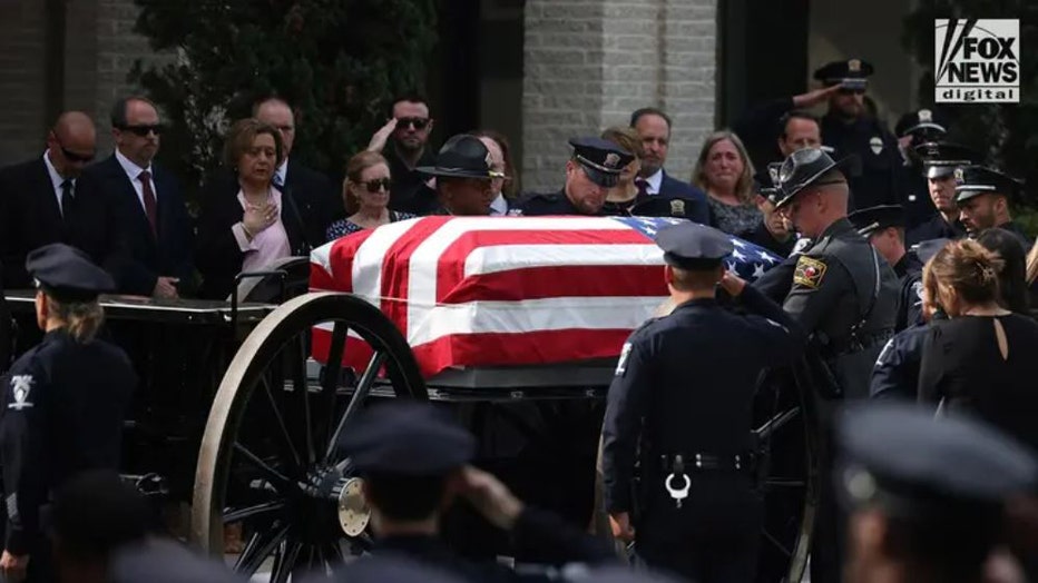 Funeral-for-Charlotte-officer.jpg