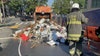Garbage truck catches fire in DC, trash dumped onto street