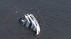 Yacht remains in Chesapeake Bay days after flipping over in open water