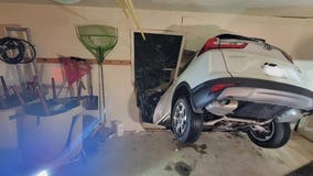 Vehicle crashes through garage, driver uninjured in Montgomery County