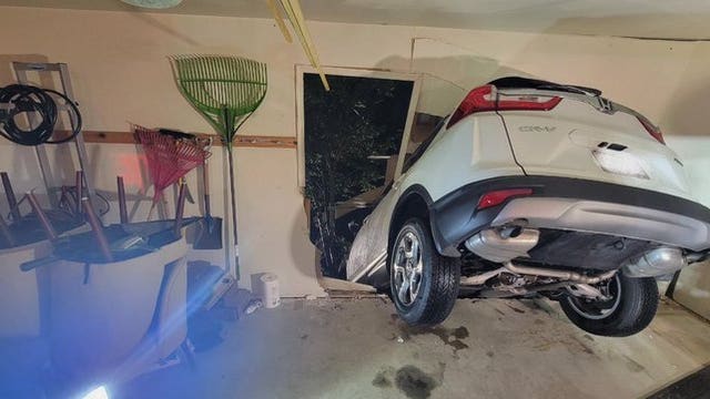 Vehicle crashes through garage, driver uninjured in Montgomery County