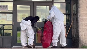 Crews cleanup bloody DC crime scene after 14-year-old boy gunned down outside rec center